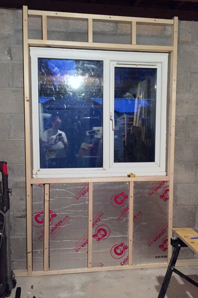 Starting to insulate the back wall